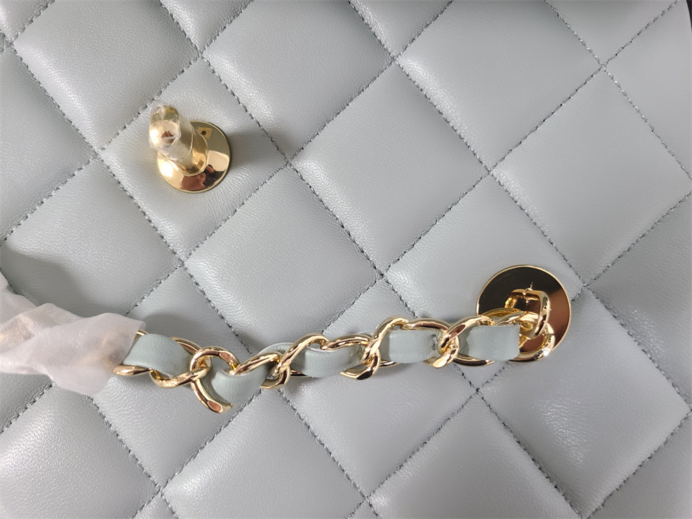 Ch*el flap bag with top handle 6.6 × 9.8 × 4.7 in