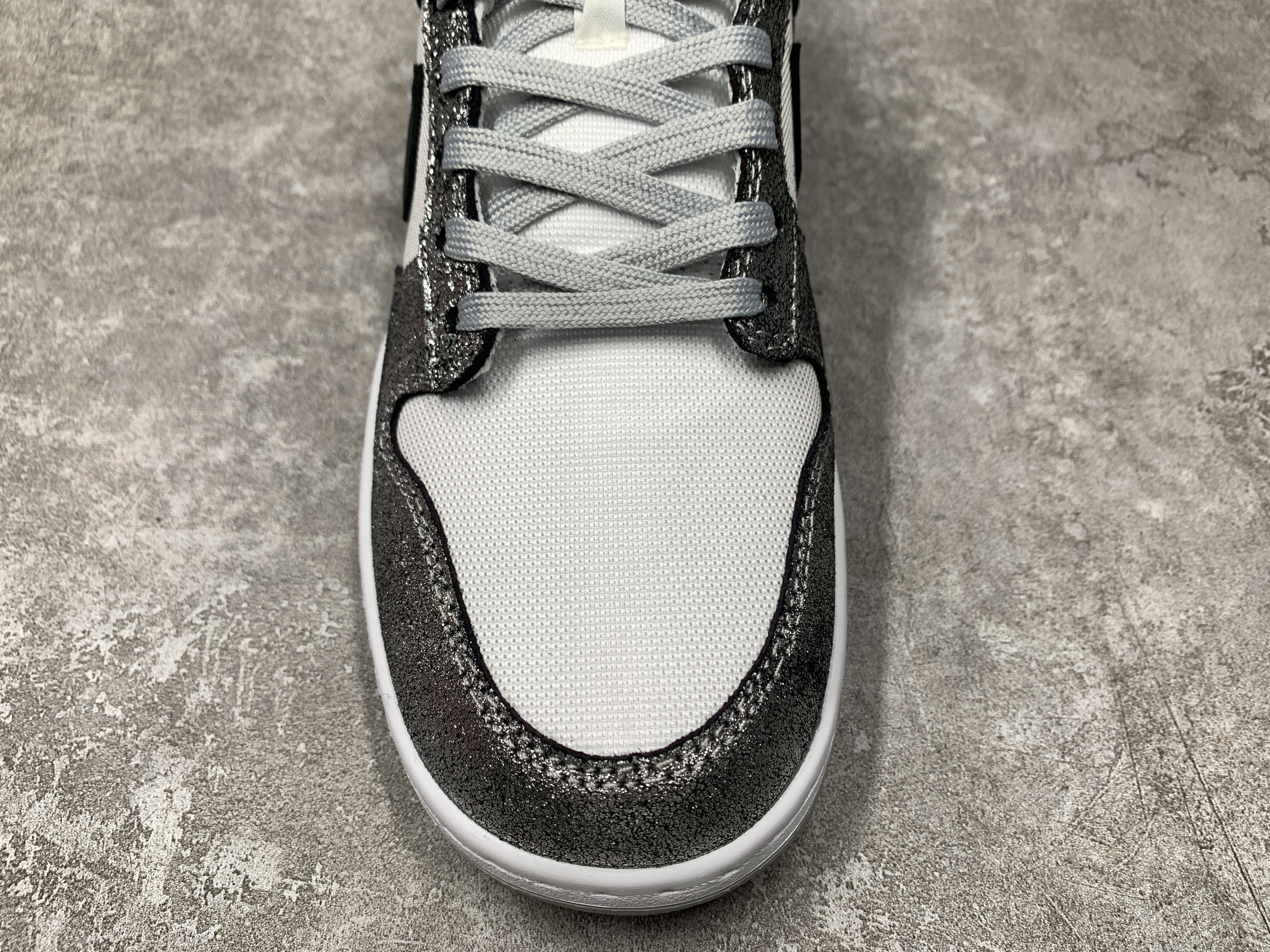 Nike Dunk Low Features Silver Cracked Leather