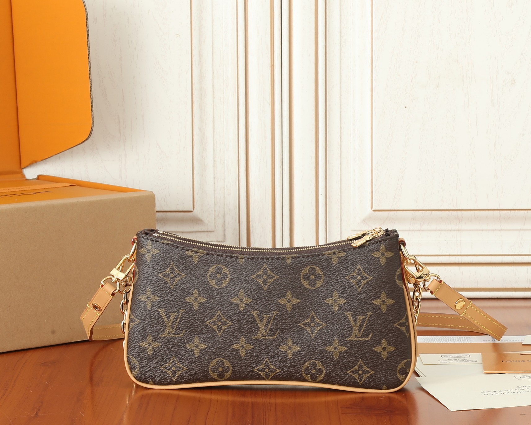 LV  Liv Pochette  M83008 9.6 x 5.3 x 2.6 inches